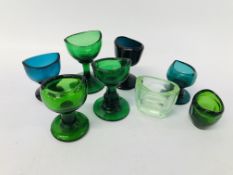 A GROUP OF 8 VINTAGE EYE BATHS COMPRISING 5 GREEN,