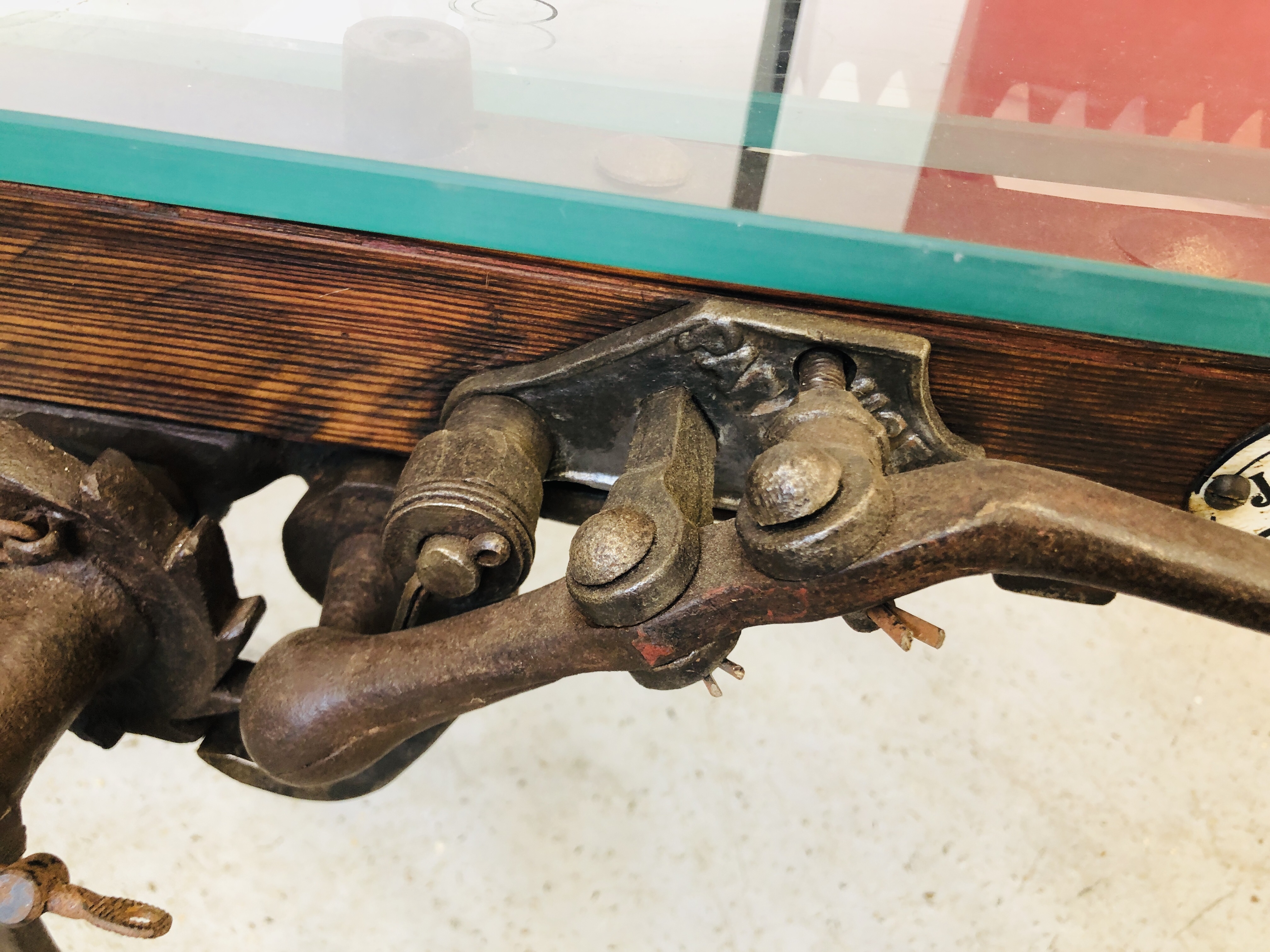 A GLASS TOP EXTENDING COFFEE TABLE CONVERTED FROM AN ANTIQUE COOKS RATCHET ACTION SACK BARROW - Image 7 of 22