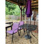 A KETTLER METAL FRAMED PATIO SET COMPRISING OF TABLE,