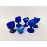 A GROUP OF 6 VINTAGE BLUE GLASS EYE BATHS