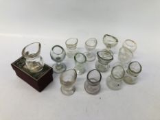 A GROUP OF 13 VINTAGE CLEAR GLASS EYE BATHS ONE HAVING ORIGINAL BOX