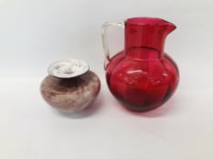 VINTAGE CRANBERRY JUG - H 18CM ALONG WITH AN ART GLASS VASE - H 9CM.