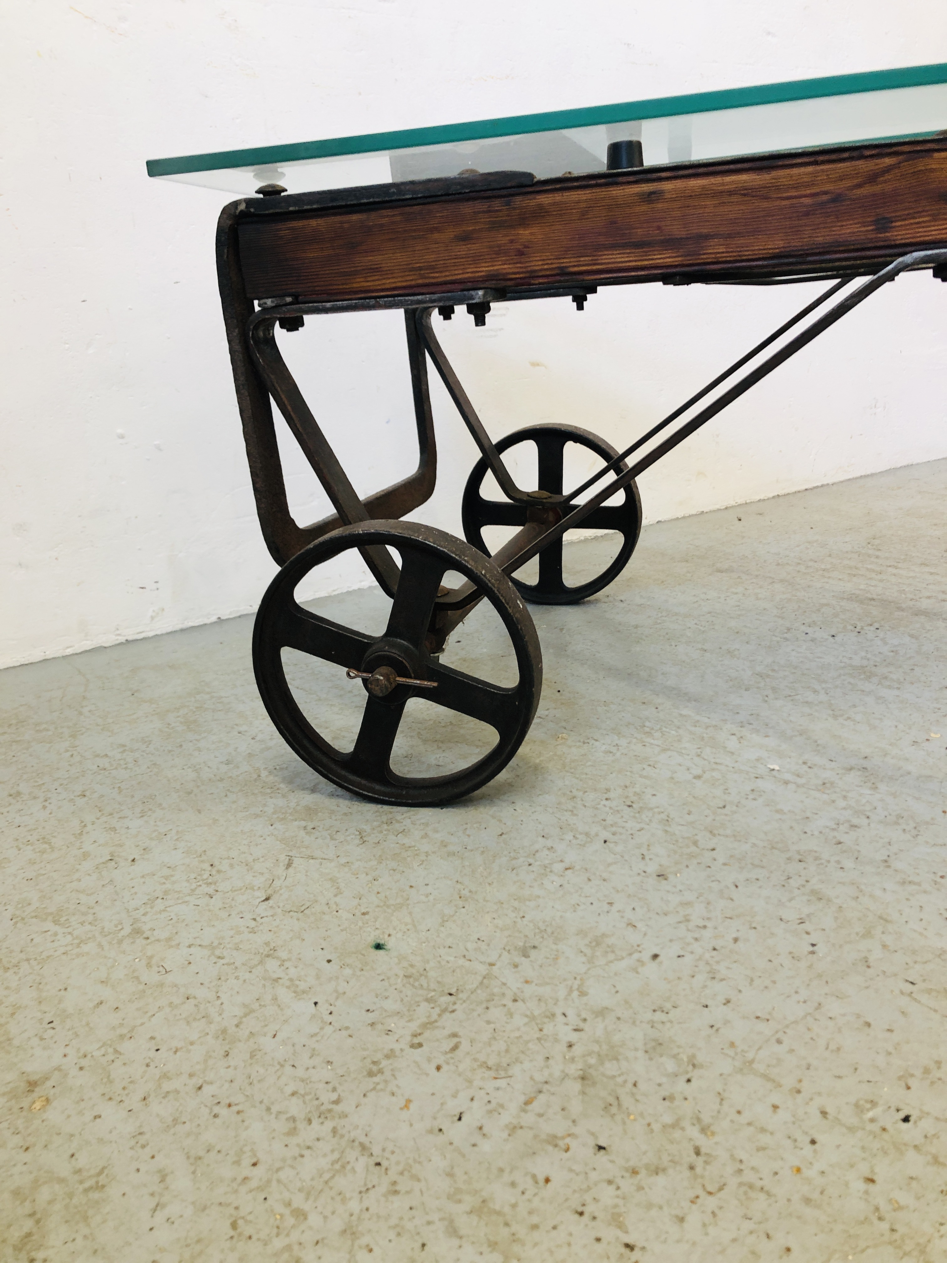 A GLASS TOP EXTENDING COFFEE TABLE CONVERTED FROM AN ANTIQUE COOKS RATCHET ACTION SACK BARROW - Image 11 of 22