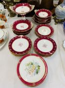 A PART DESSERT SERVICE DECORATED WITH FLOWERS WITHIN MAROON BANDS APPROX 24 PIECES (SOME REQUIRES