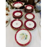 A PART DESSERT SERVICE DECORATED WITH FLOWERS WITHIN MAROON BANDS APPROX 24 PIECES (SOME REQUIRES