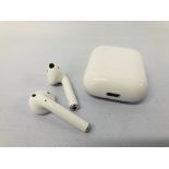 A PAIR OF APPLE EARPODS IN CASE - SOLD AS SEEN