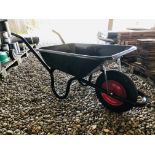 AN AS NEW 4 TRACK GENERAL BUILDERS 85 LITRE WHEELBARROW