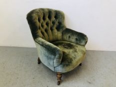 EDWARDIAN BUTTON BACK EASY CHAIR UPHOLSTERED IN GREEN VELVET