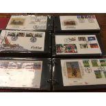 BOX WITH GB FIRST DAY COVERS IN SEVEN ALBUMS,
