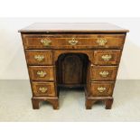 A GEORGE II WALNUT KNEEHOLE DESK WITH ARCHED CUPBOARD BELOW W 78CM, D 51CM ,