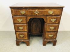 A GEORGE II WALNUT KNEEHOLE DESK WITH ARCHED CUPBOARD BELOW W 78CM, D 51CM ,