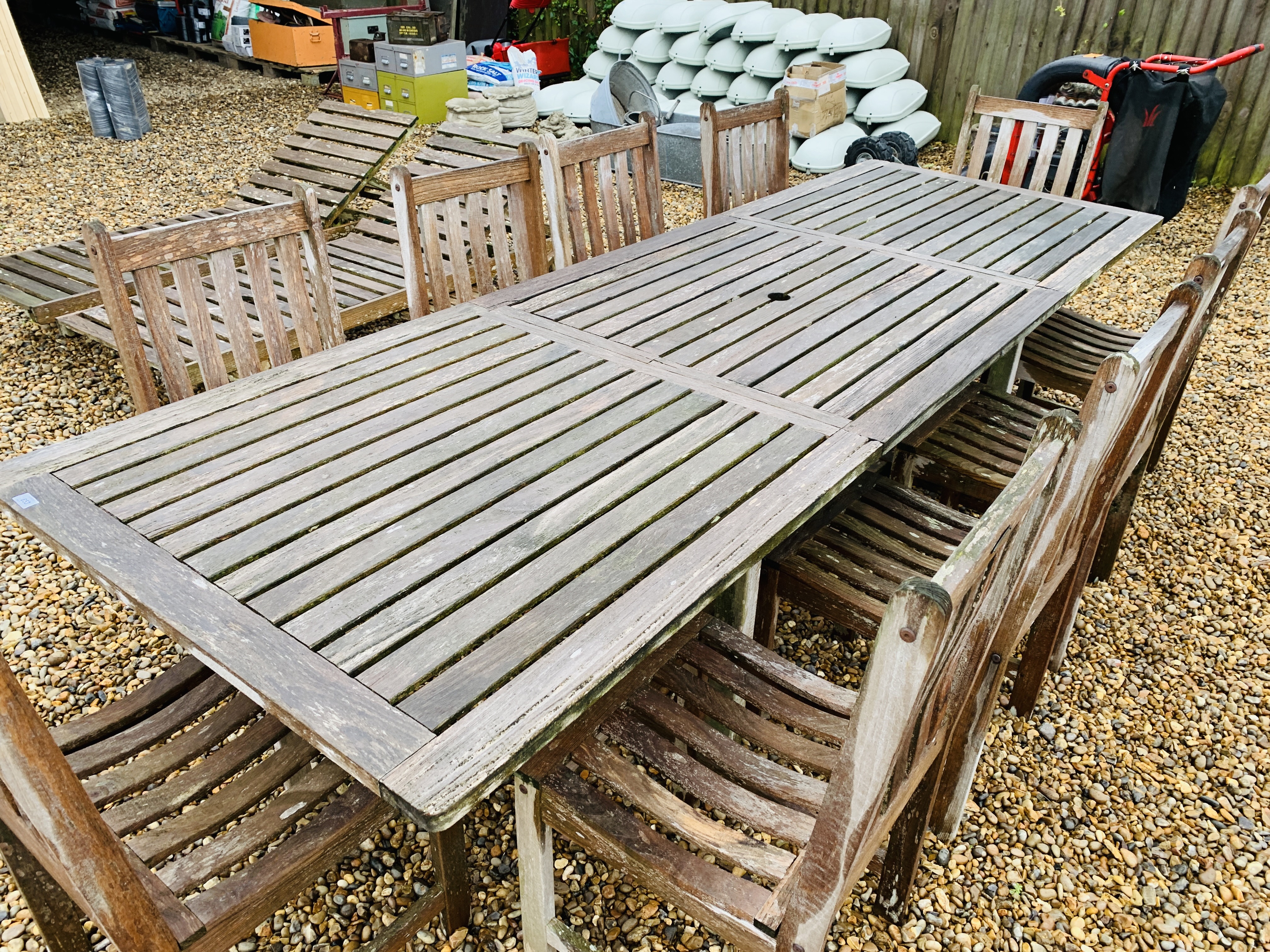 A WESTMINSTER TEAK EXTENDING GARDEN TABLE AND A SET OF TEN DINING CHAIRS PLUS 2 RECLINING SUN - Image 7 of 10