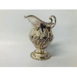 C19TH SILVER CREAM JUG OF DOUBLE OGEE FORM, SCROLLED HANDLE - H 11CM.