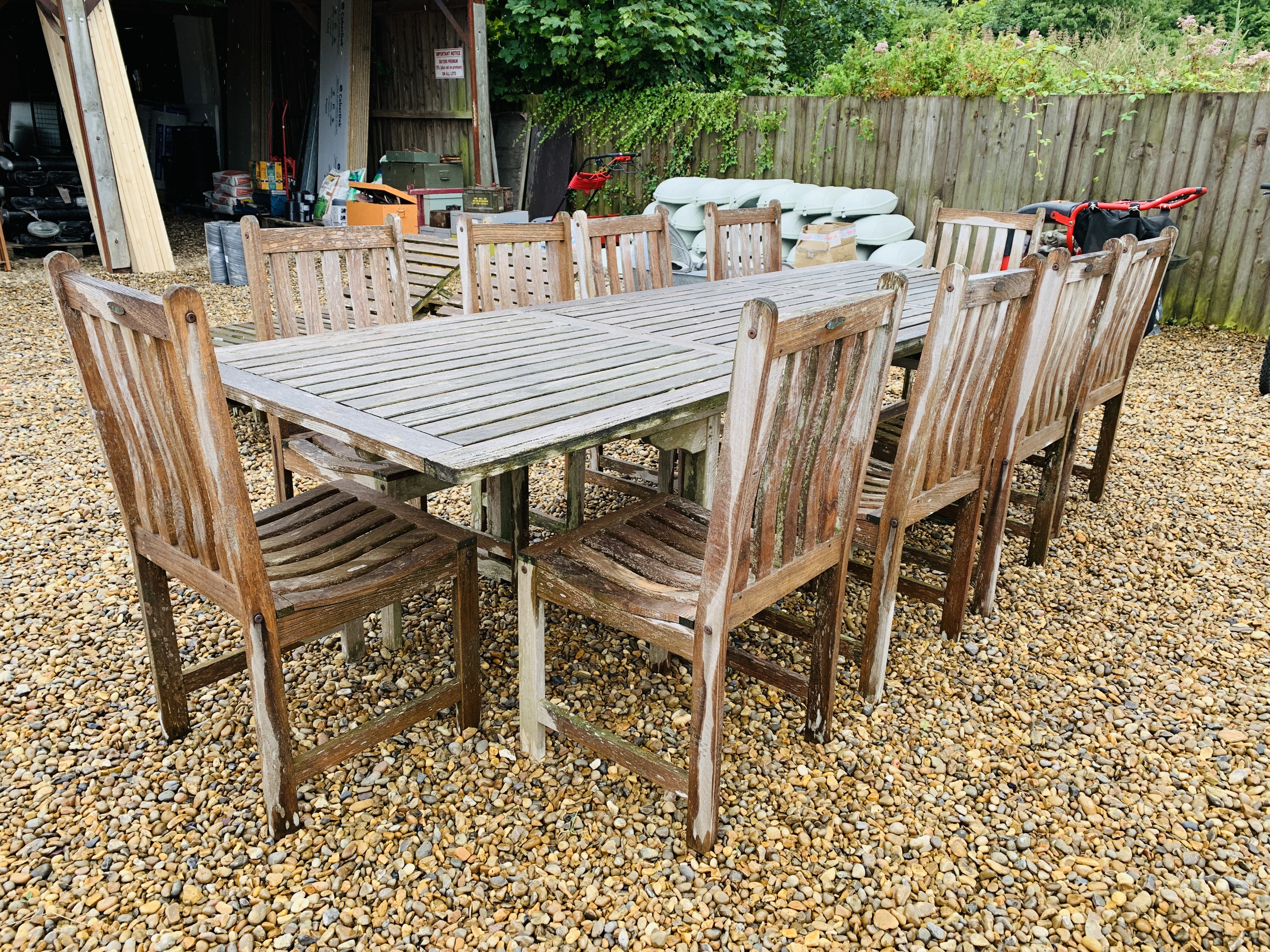 A WESTMINSTER TEAK EXTENDING GARDEN TABLE AND A SET OF TEN DINING CHAIRS PLUS 2 RECLINING SUN - Image 6 of 10
