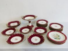 A PART DESSERT SERVICE DECORATED WITH FLOWERS WITHIN MAROON BANDS APPROX 24 PIECES (SOME REQUIRES