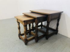 NEST OF THREE OAK GRADUATED "NATHAN" OCCASIONAL TABLES