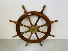 A LARGE SHIPS WHEEL