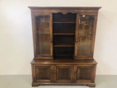 A QUALITY OAK REPRODUCTION SIDEBOARD WITH 2 GLAZED DOORS TO TOP AND 3 CENTRAL SHELVES ABOVE 3 DOOR