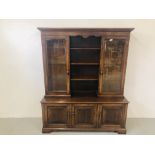 A QUALITY OAK REPRODUCTION SIDEBOARD WITH 2 GLAZED DOORS TO TOP AND 3 CENTRAL SHELVES ABOVE 3 DOOR