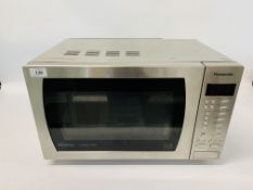 A PANASONIC STAINLESS STEEL INVERTOR MICROWAVE OVEN WITH INSTRUCTIONS - SOLD AS SEEN