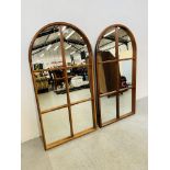 A PAIR OF ARCHED TOP GLASS PANEL WALL MIRRORS, HEIGHT 110CM,