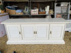 A WHITE FINISH FOUR DOOR DRESSER BASE WITH LOUVERED DOORS, WIDTH 200CM, DEPTH 52CM,