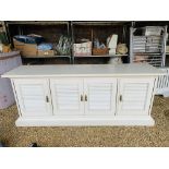 A WHITE FINISH FOUR DOOR DRESSER BASE WITH LOUVERED DOORS, WIDTH 200CM, DEPTH 52CM,