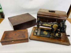 A VINTAGE JONES HAND SEWING MACHINE WITH HIGHLY DECORATIVE GILT FINISH & ORIGINAL COVER,