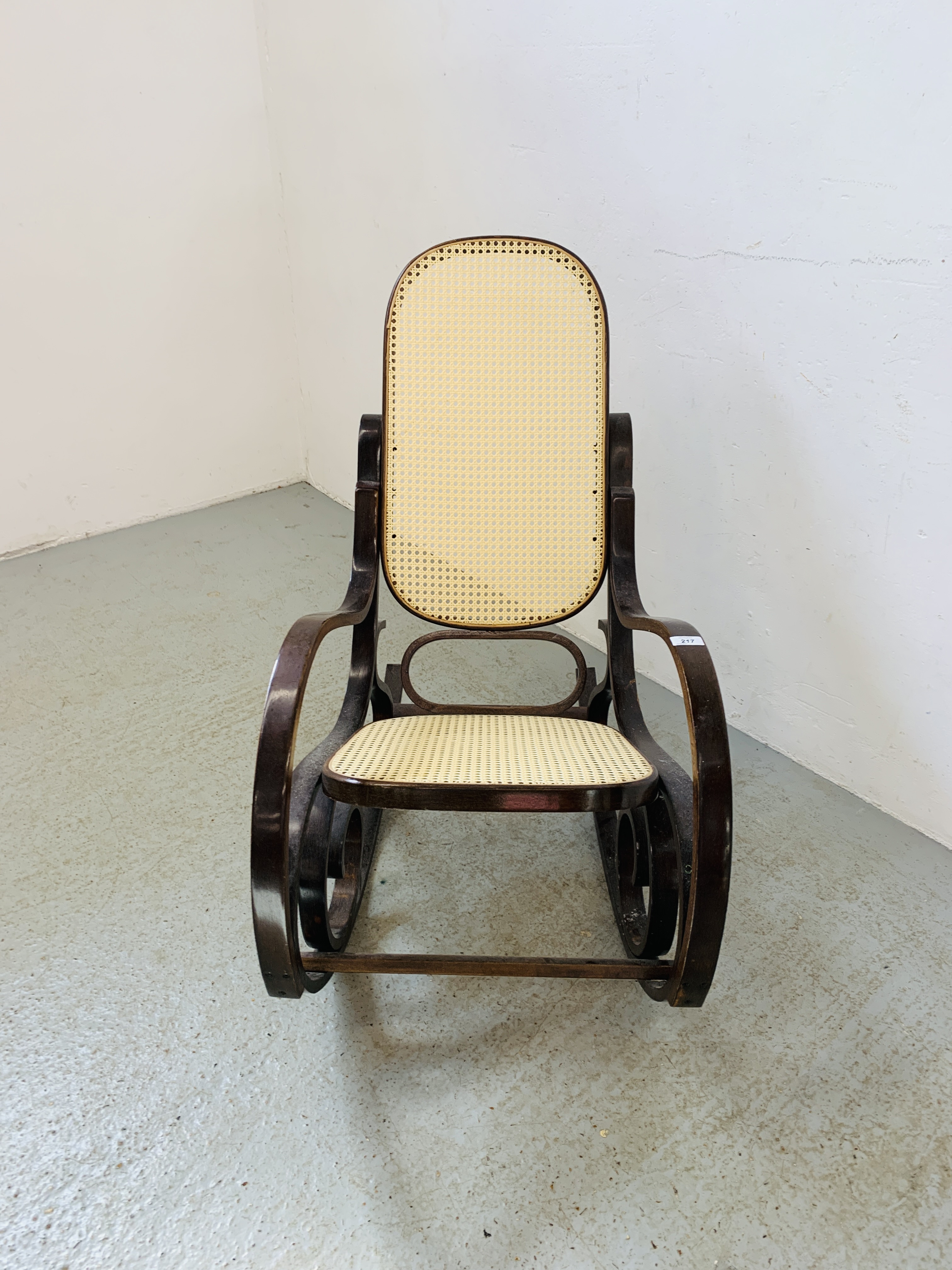 A BENTWOOD ROCKING CHAIR WITH RATTAN SEAT AND BACK - Image 3 of 6