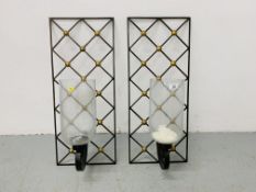 A PAIR OF METALCRAFT WALL HANGINGS, DESIGNER CANDLE LAMPS - HEIGHT 76CM. WIDTH 32CM.