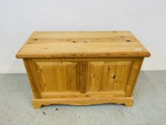 A SOLID WAXED PINE BLANKET BOX - W 94CM. D 42CM. H 62CM.