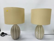 A PAIR OF MODERN TABLE LAMPS WITH CREAM SHADES HEIGHT 53CM - SOLD AS SEEN