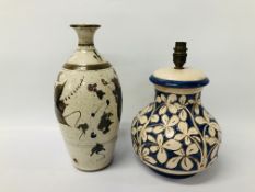 AN ITALIAN BLUE AND WHITE POTTERY LAMP BASE ALONG WITH 1 OTHER MIKE POWERS STUDIO POTTERY LAMP BASE