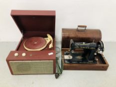 A SINGER SEWING MACHINE IN CASE + A COLLARO RECORD PLAYER (COLLECTOR'S ITEM ONLY) - SOLD AS SEEN