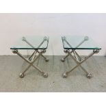 A PAIR OF DESIGNER CHROME FRAMED GLASS TOP LAMP TABLES,