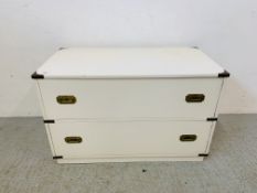 A WHITE PAINTED MILITARY STYLE TWO DRAWER CHEST WITH RETRACTABLE BRASS HANDLES AND BRASS CORNER