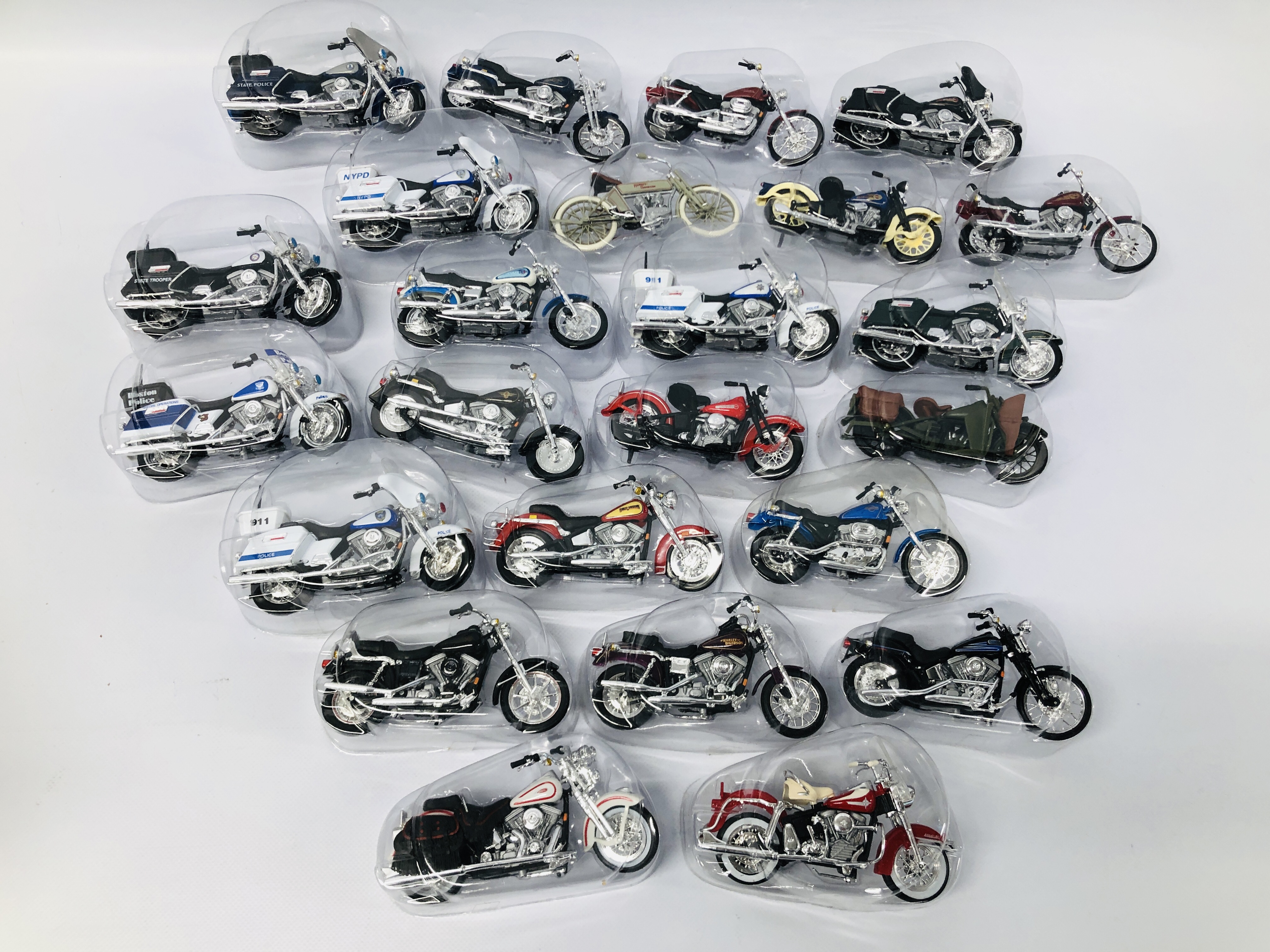 A COMPLETE SET OF 24 HARLEY DAVIDSON MODEL MOTORCYCLES "THE LEGENDS COLLECTION"