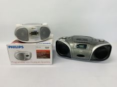 A PHILIPS DYNAMIC BOOST PORTABLE CD RADIO AND A JVC PORTABLE RADIO CASSETTE