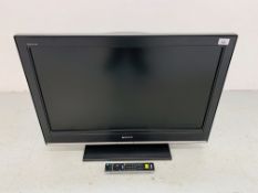 A SONY BRAVIA 32 INCH TELEVISION WITH REMOTE - SOLD AS SEEN