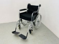 AN ANGEL MOBILITY FOLDING WHEELCHAIR COMPLETE WITH FOOT RESTS AND SEAT CUSHIONS