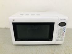 A PANASONIC SLIMLINE COMBI INVERTER MICROWAVE - SOLD AS SEEN