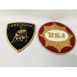 2 X CAST IRON ADVERTISING SIGNS "BSA" DIAMETER 24.5CM AND "LAMBOURGHINI" H 22CM. W 19.5CM.