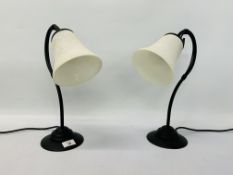 A PAIR OF MODERN SWAN NECK BEDSIDE LAMPS WITH OPAQUE GLASS SHADES - HEIGHT 38CM.