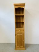 A FULL HEIGHT SOLID PINE BOOKSHELF WITH SINGLE DRAWER AND CABINET BASE - WIDTH 47CM. DEPTH 36CM.