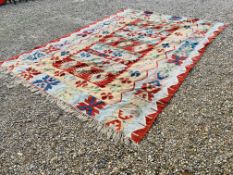 A LARGE KELIM PATTERNED RUG 404CM X 30CM (REPAIRED)