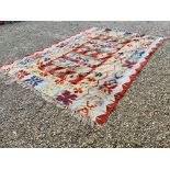 A LARGE KELIM PATTERNED RUG 404CM X 30CM (REPAIRED)