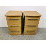 PAIR OF MODERN LIGHT OAK FINISH THREE DRAWER BEDSIDE CHESTS