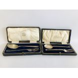 A SILVER CHRISTENING SET COMPRISING OF A SPOON AND FORK IN A WARING AND GILLOWS CASE,