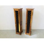 A PAIR OF RUSTIC HARDWOOD CD MEDIA STORAGE CABINETS WITH IRON CRAFT DETAIL EACH H 92CM. W 20CM.