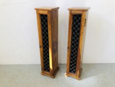 A PAIR OF RUSTIC HARDWOOD CD MEDIA STORAGE CABINETS WITH IRON CRAFT DETAIL EACH H 92CM. W 20CM.